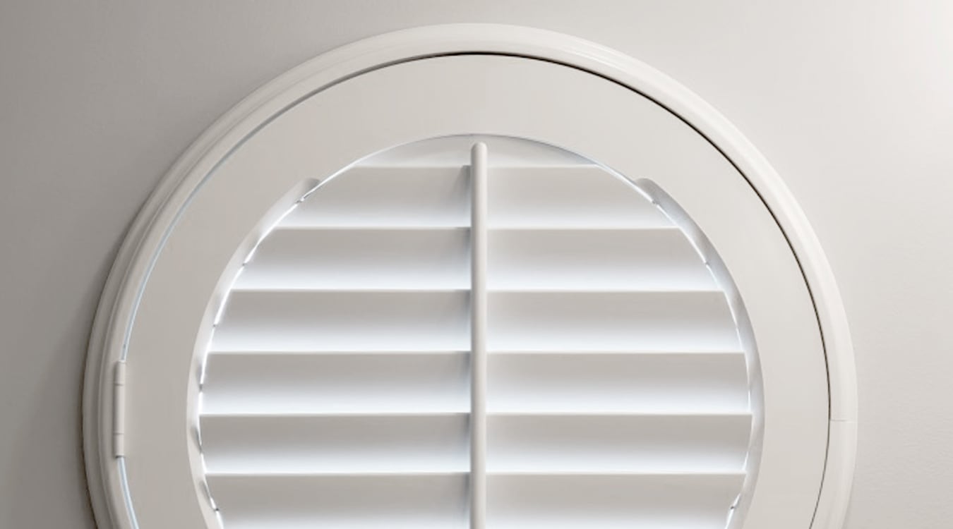 Sunburst circular shutters on specialty windows